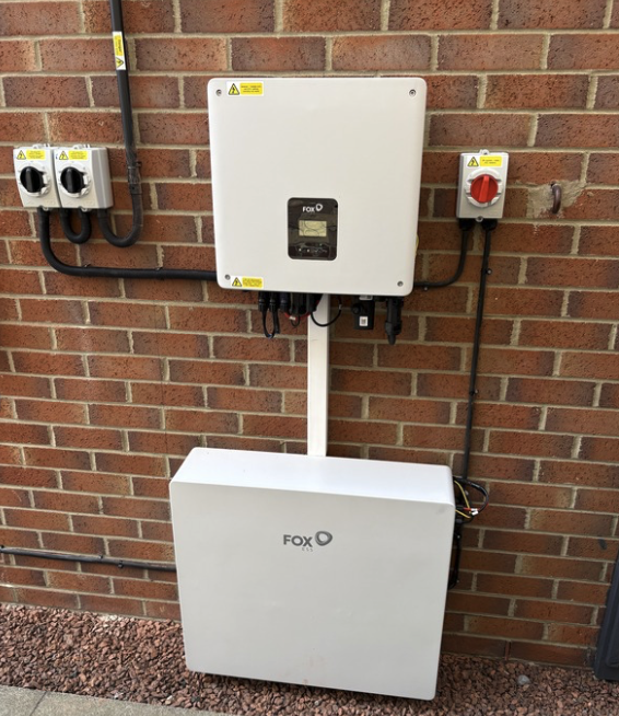 Fox home battery and inverter installed alongside a residential solar system